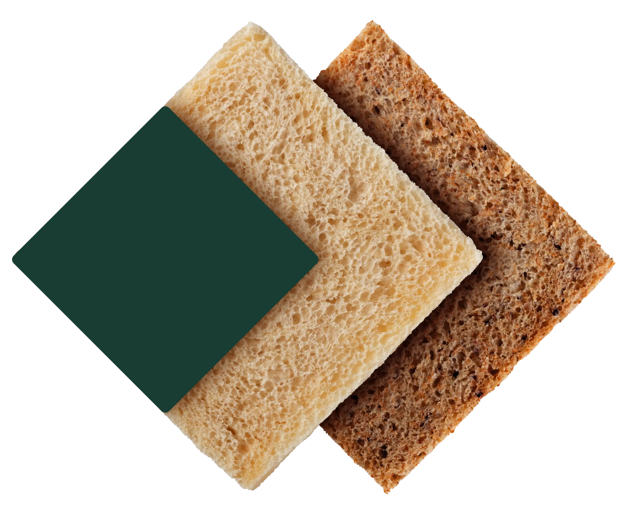 Fette di pane bianco e integrale sovrapposte su sfondo nero